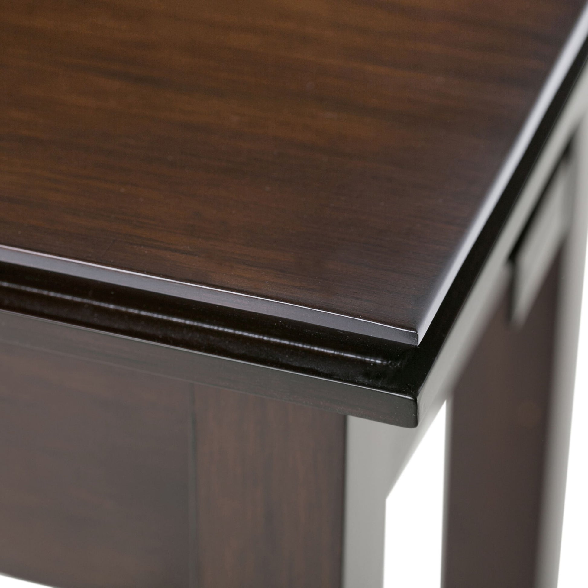 Close-up of the Artisan - Handcrafted Narrow Side Table corner, highlighting its dark brown, smooth polished surface and sharp edges against a white background.