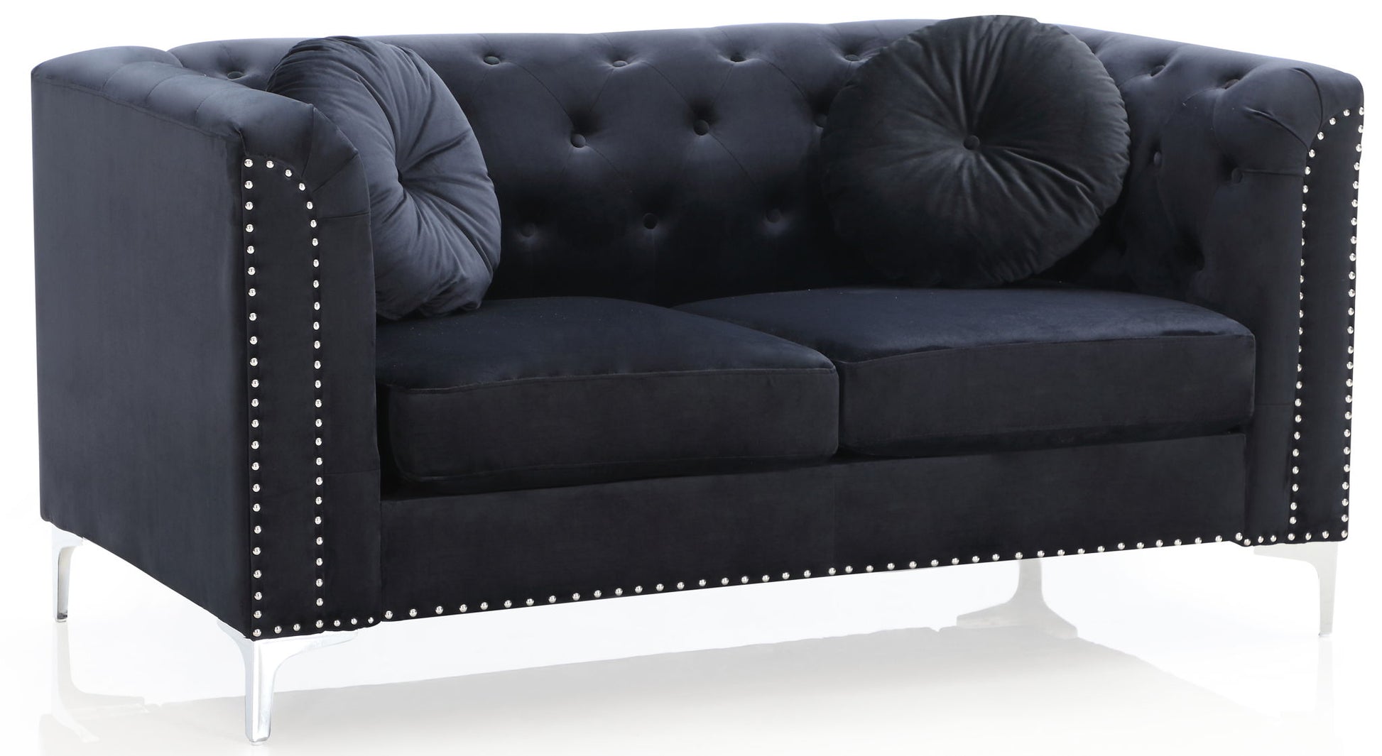 The Stylish Sloped Arm Loveseat features a modern black velvet design with a button-tufted backrest, silver nailhead trim, two round black throw pillows, and sleek silver metal legs.