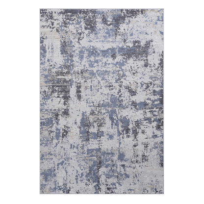 The Payas Abstract Area Rug features a distressed pattern in blue, gray, and white tones. Its overlapping colors create a textured, weathered look throughout the rectangular design.