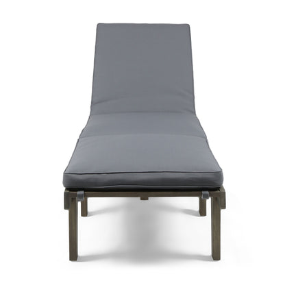 The Ariana Wood Chaise Lounge With Cushion features a modern gray design with a cushioned seat and backrest, dark wooden legs, and a minimalist front view.