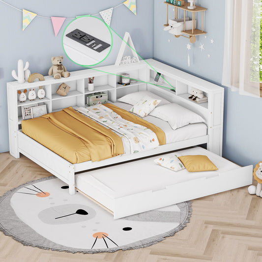 A cozy, light-filled kids’ room with the Wooden Full Size Daybed With Twin Size Trundle in white, featuring storage shelves and USB charging ports on the headboard. Shown with yellow and white bedding, stuffed toys, bunting, and a round animal rug.