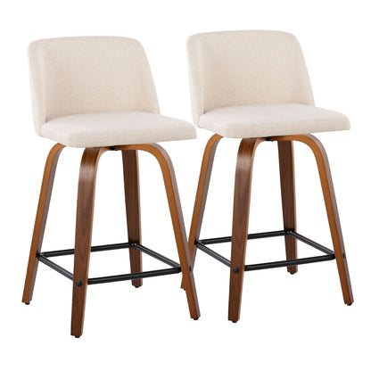 The Toriano Mid Century Modern Counter Stool set includes two swivel barstools with light beige upholstered seats, curved walnut-finished wooden legs, and square black metal footrests.