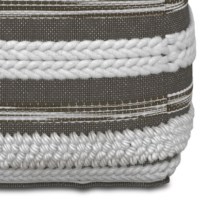 Close-up of the Sommer - Handcrafted Square Pouf, showcasing textured fabric with brown and white horizontal stripes and two thick, woven white braided bands across the surface.