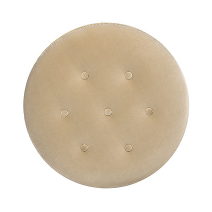 A top view of the Yolanda Round Upholstered Accent Ottoman, featuring a beige cushion with six evenly spaced buttons arranged in a hexagonal pattern.