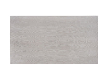 The Marta Dining Table features a rectangular tabletop in natural wood with a light grain pattern and smooth finish, shown against a white background.