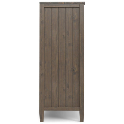 Lev - Medium Storage Cabinet in Smoky Brown, shown from the side, features a tall, rectangular shape with a vertical plank design and dark brown finish.