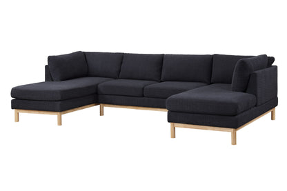 The Hallie Wide Sherpa Double Chaise U-Shape Sectional Sofa features black cushions, a light wooden base and legs, a left chaise lounge, and a right corner seat in a modern L-shaped design.