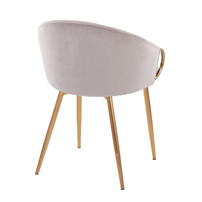 The Claire - Contemporary Glam Chair features a curved, light beige upholstered backrest and gold-colored metal legs, seen from behind. A circular gold handle adorns the back for a stylish accent.
