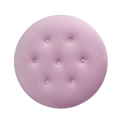 The Yolanda Round Upholstered Accent Ottoman features a light purple, velvety finish with seven evenly spaced tufted buttons, shown from above on a white background.