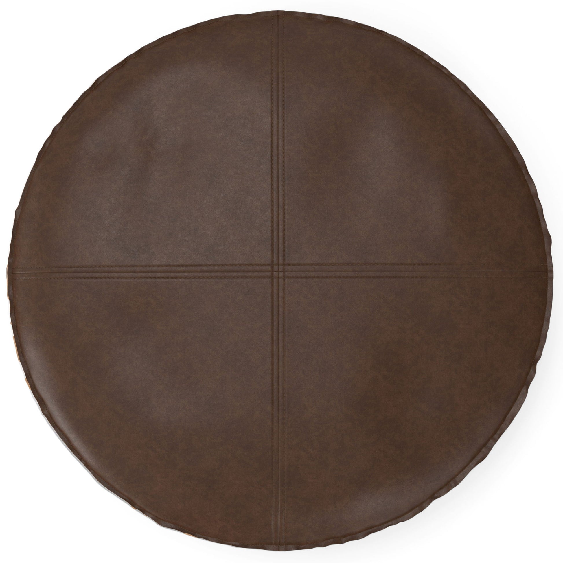 The Brody - Round Pouf is a dark brown leather cushion featuring visible stitched lines that form a cross pattern across its top surface.