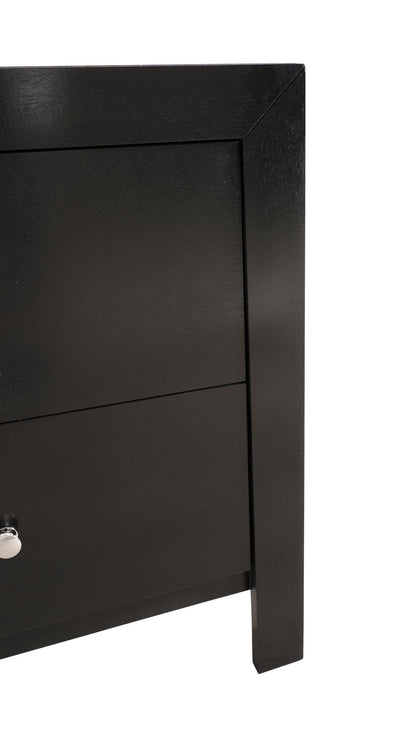 Close-up of the Charming Nightstand With Drawers, featuring a black wooden finish, part of a drawer with a metallic knob, set against a white background.
