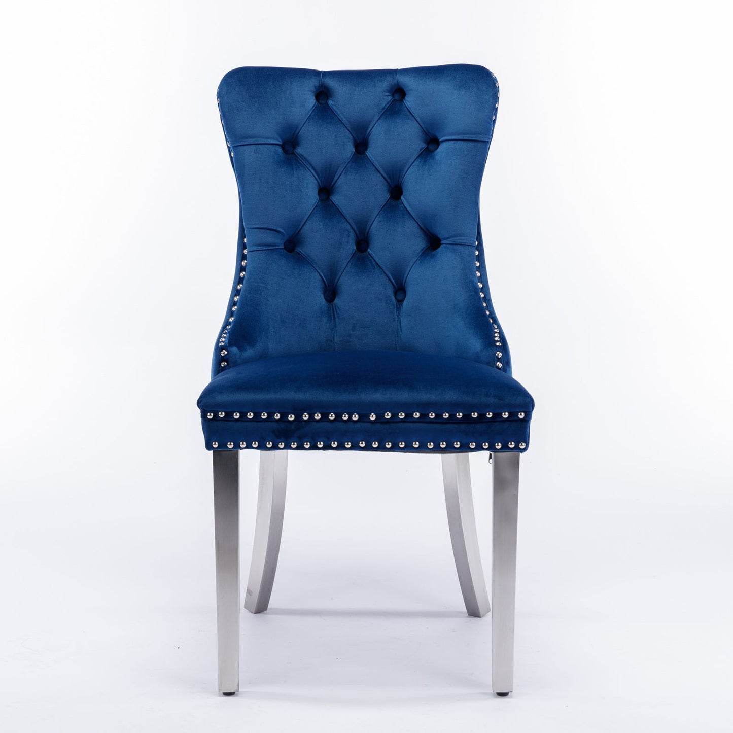 The Nikki set includes two modern, high-end velvet dining chairs with tufted backs, nailhead trim, and four chrome stainless steel plated legs, shown against a plain white background.