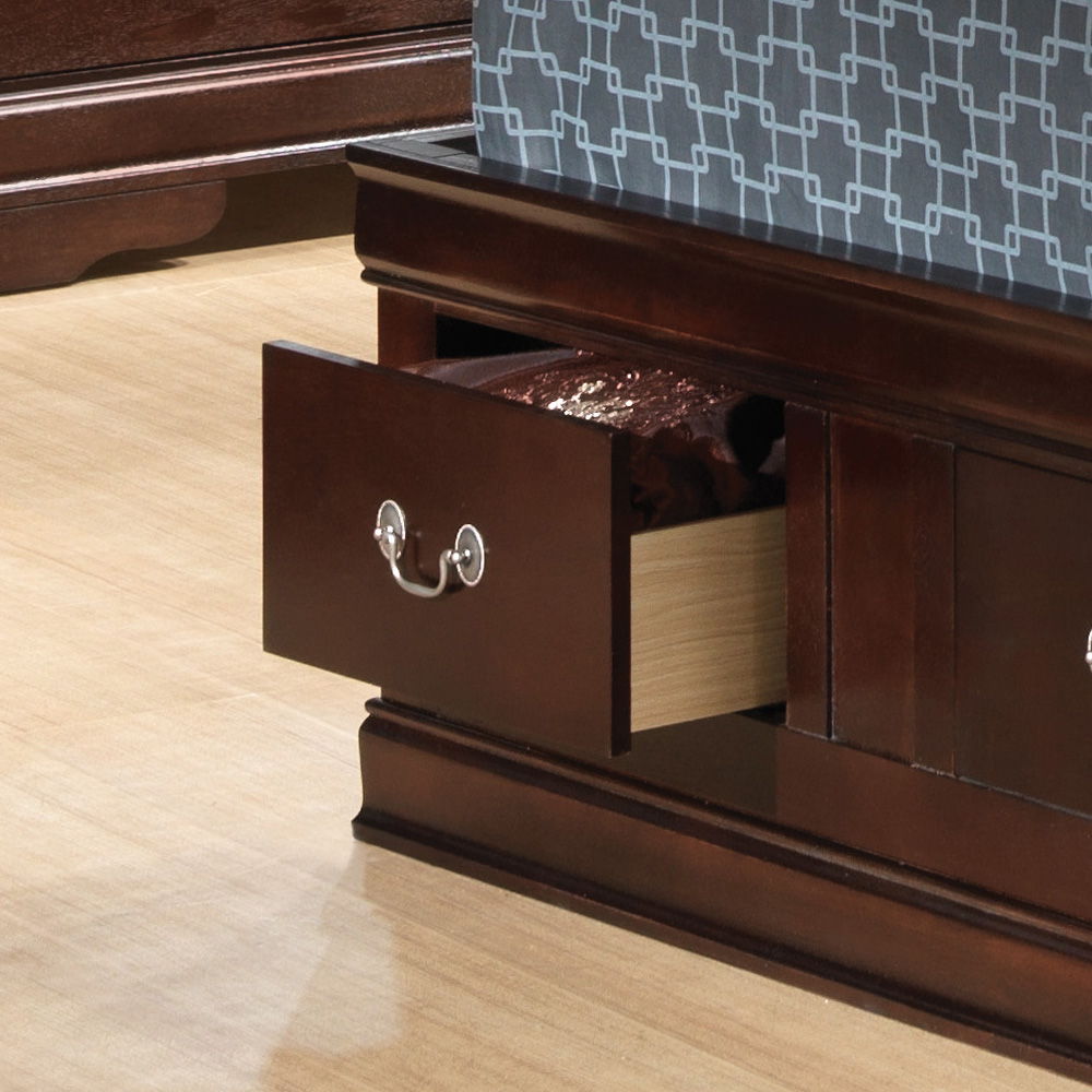 The Louis Phillipe - Bookcase Storage Bed features a dark wood frame with a built-in storage drawer, partially open to reveal a folded blanket inside, placed on a light-colored floor.