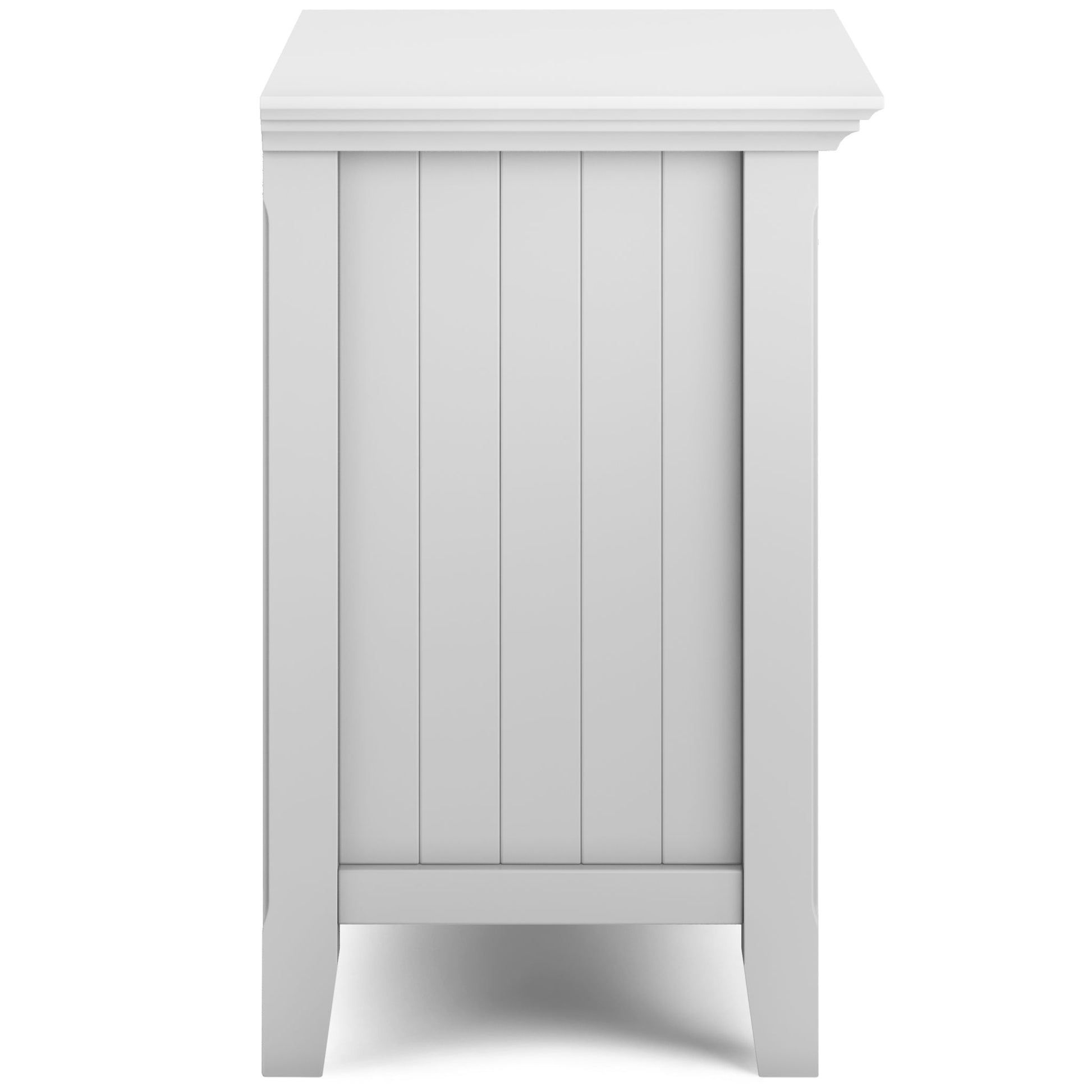 Side view of the Acadian - Bedside Table, Handcrafted in white wood with vertical paneling, decorative trim on top, and four sturdy legs. The simple, clean design highlights the elegant panel details.