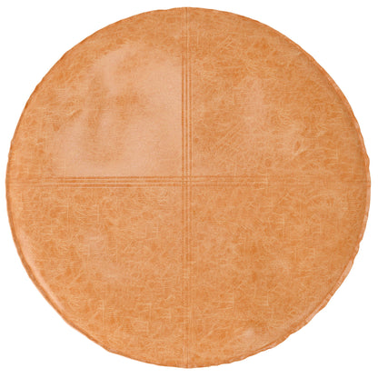 The Brody - Round Pouf is a large, round seat in light brown with a gently textured surface and a subtle cross design at the center.