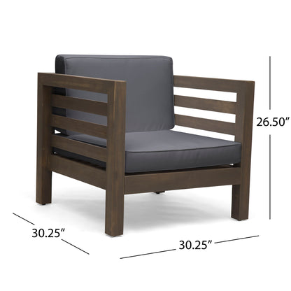 The Outdoor Acacia Wood Patio Chair With Fabric Cushion features gray cushions and a wooden slat frame, measuring 30.25"W x 30.25"D x 26.5"H—perfect for modern outdoor seating.
