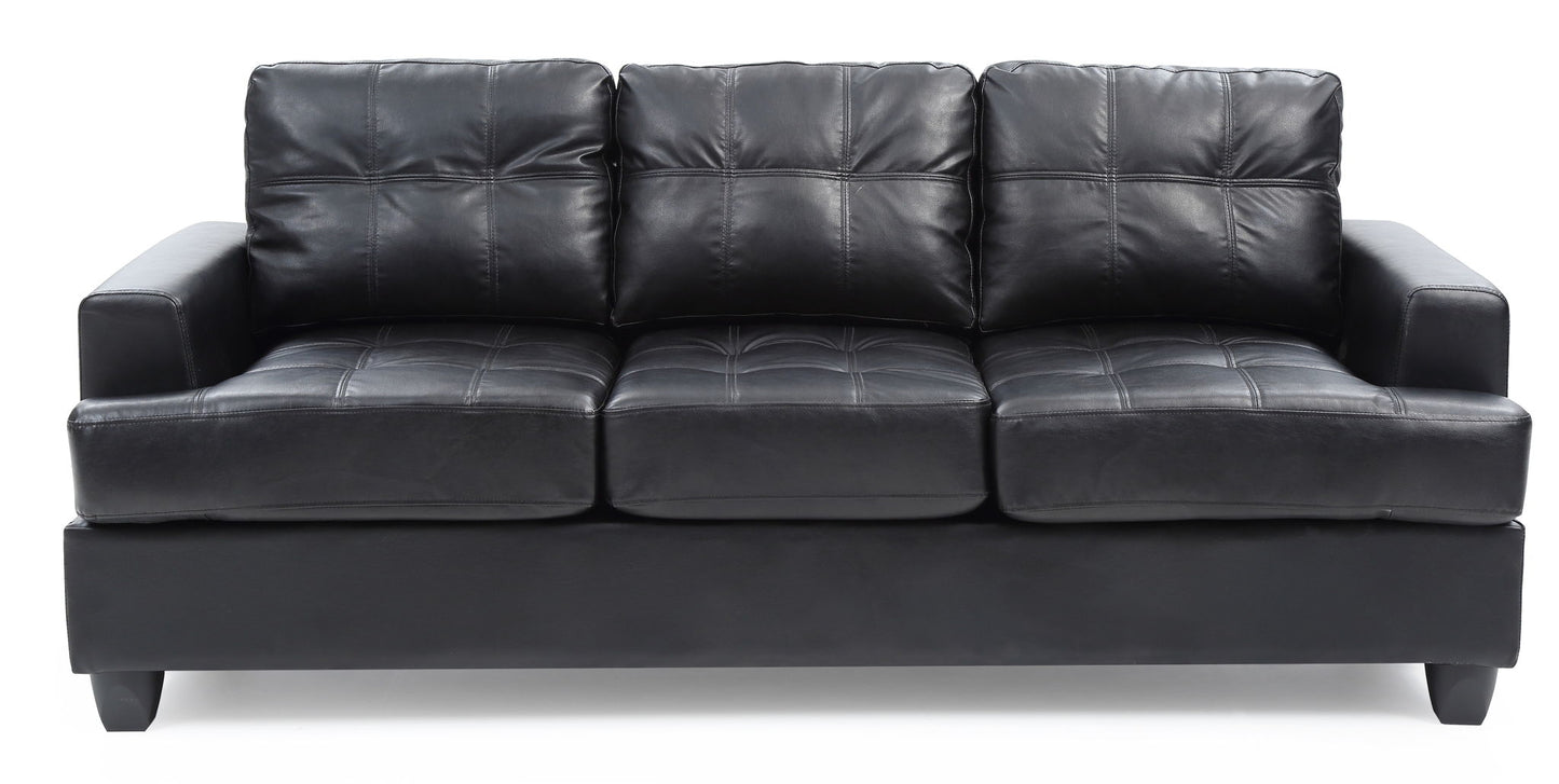 The Sandridge - Sofa is a black leather three-seater featuring square cushions, tufted seat and back detailing, and straight armrests, shown against a white background.