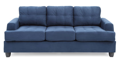 The Sandridge - Sofa is a blue three-seater with plush cushions and armrests, shown against a white background.