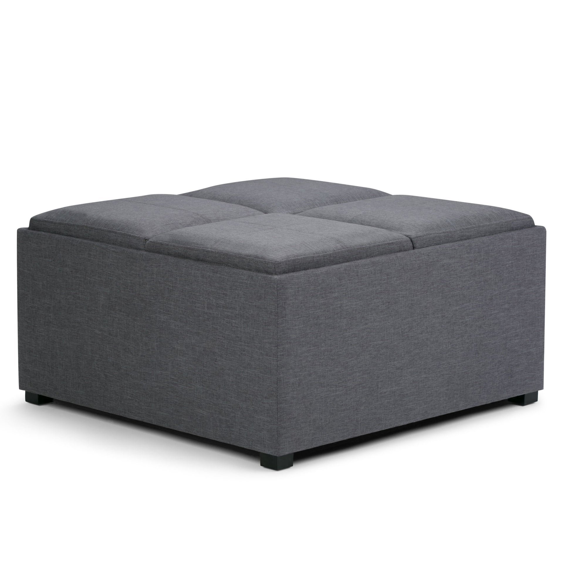 The Avalon Square Coffee Table, Storage Ottoman features dark grey upholstered fabric, a tufted top, and short black legs. It serves as a footrest, coffee table, or extra seating.