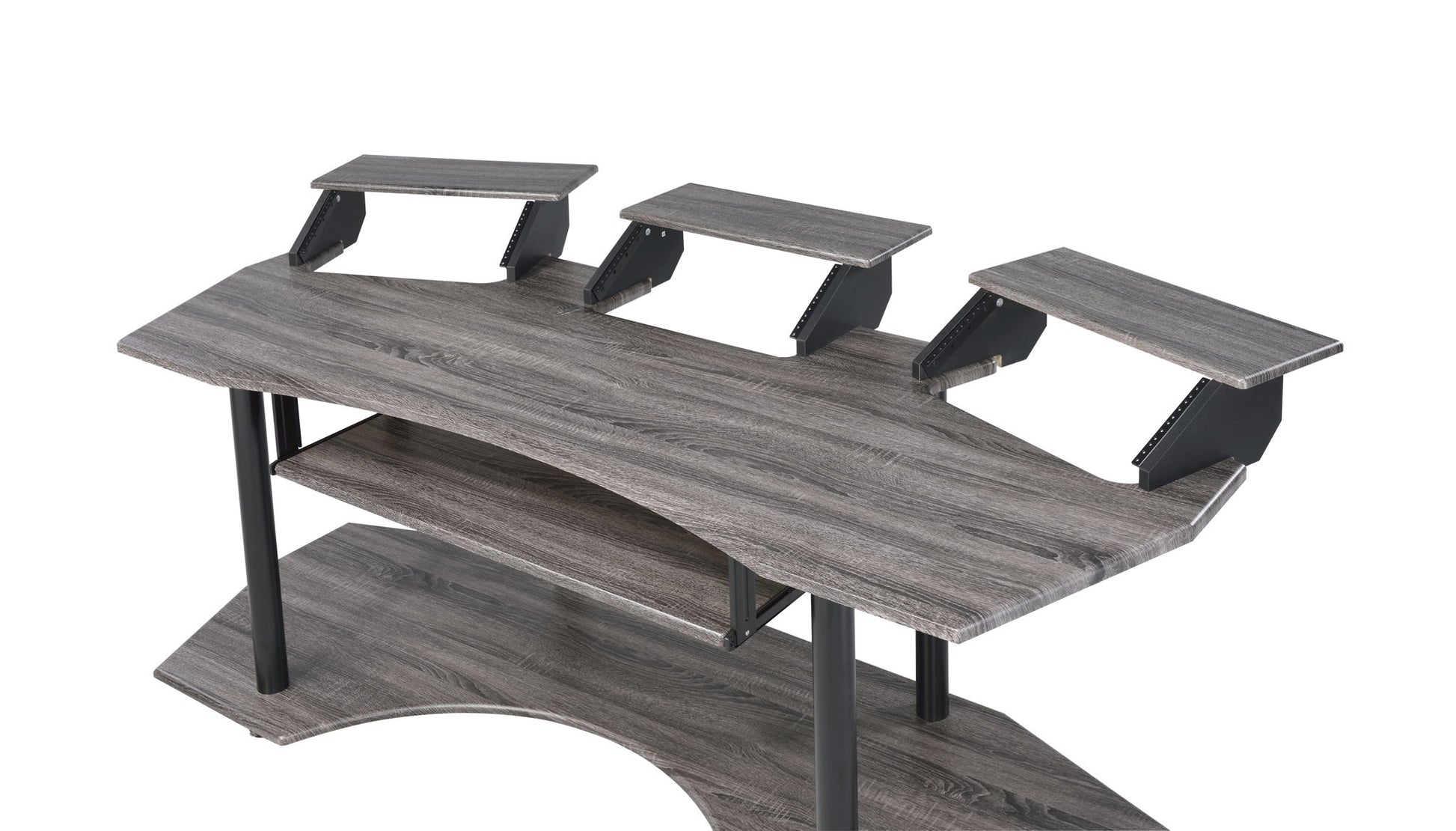 The Eleazar Music Recording Studio Desk features a gray wood finish, three elevated monitor shelves, a spacious main surface, an extra lower storage shelf, and black metal supports in a modern ergonomic design.