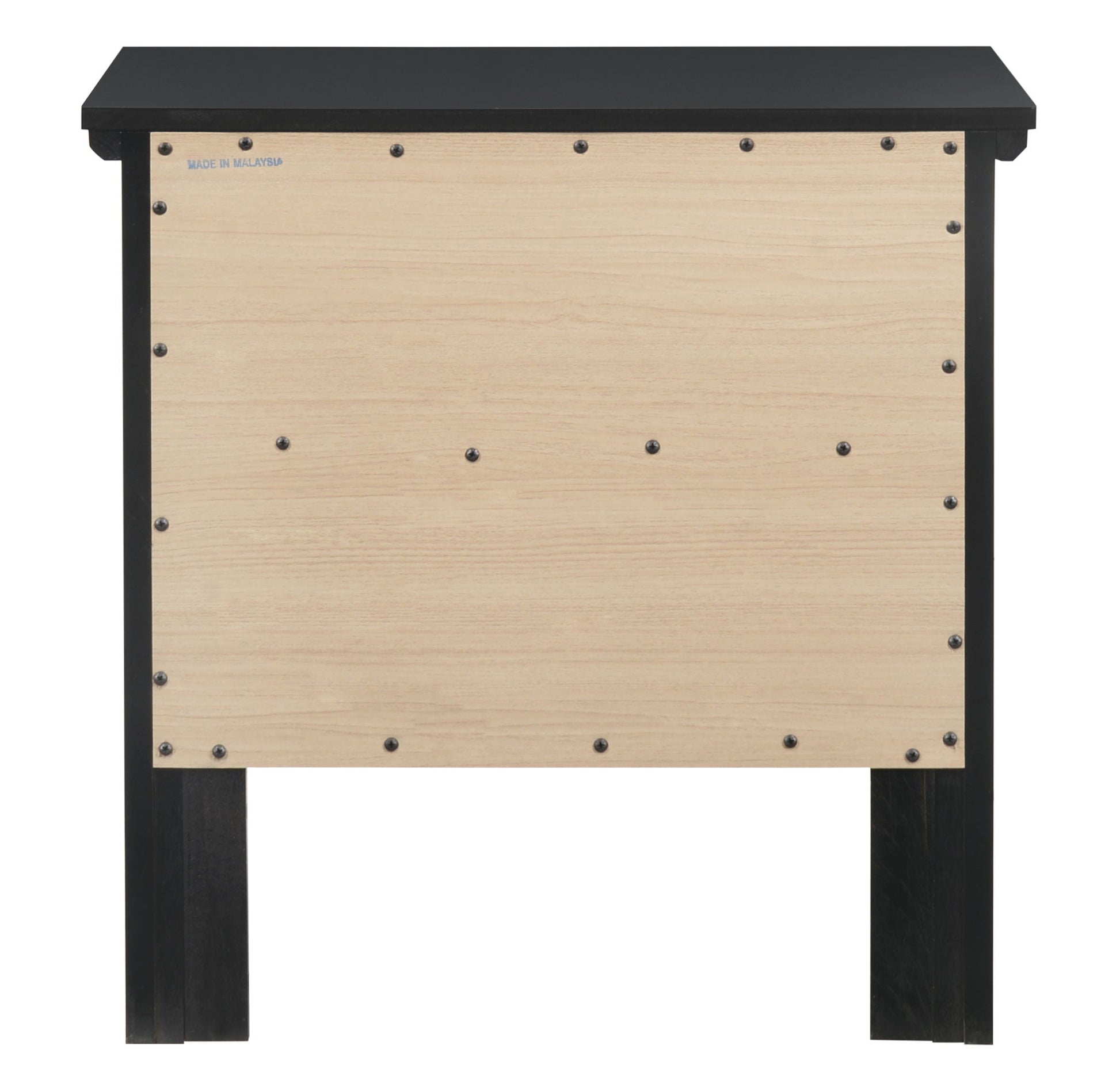 The Primo - Nightstand is a simple wooden piece with a black top and legs, plus a light wood back panel secured by visible screws. "MADE IN MALAYSIA" is stamped on the panel's top left corner.