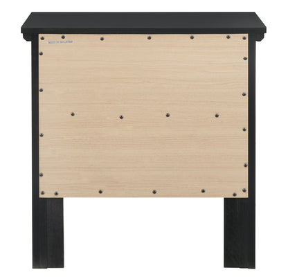The Primo - Nightstand is a simple wooden piece with a black top and legs, plus a light wood back panel secured by visible screws. "MADE IN MALAYSIA" is stamped on the panel's top left corner.