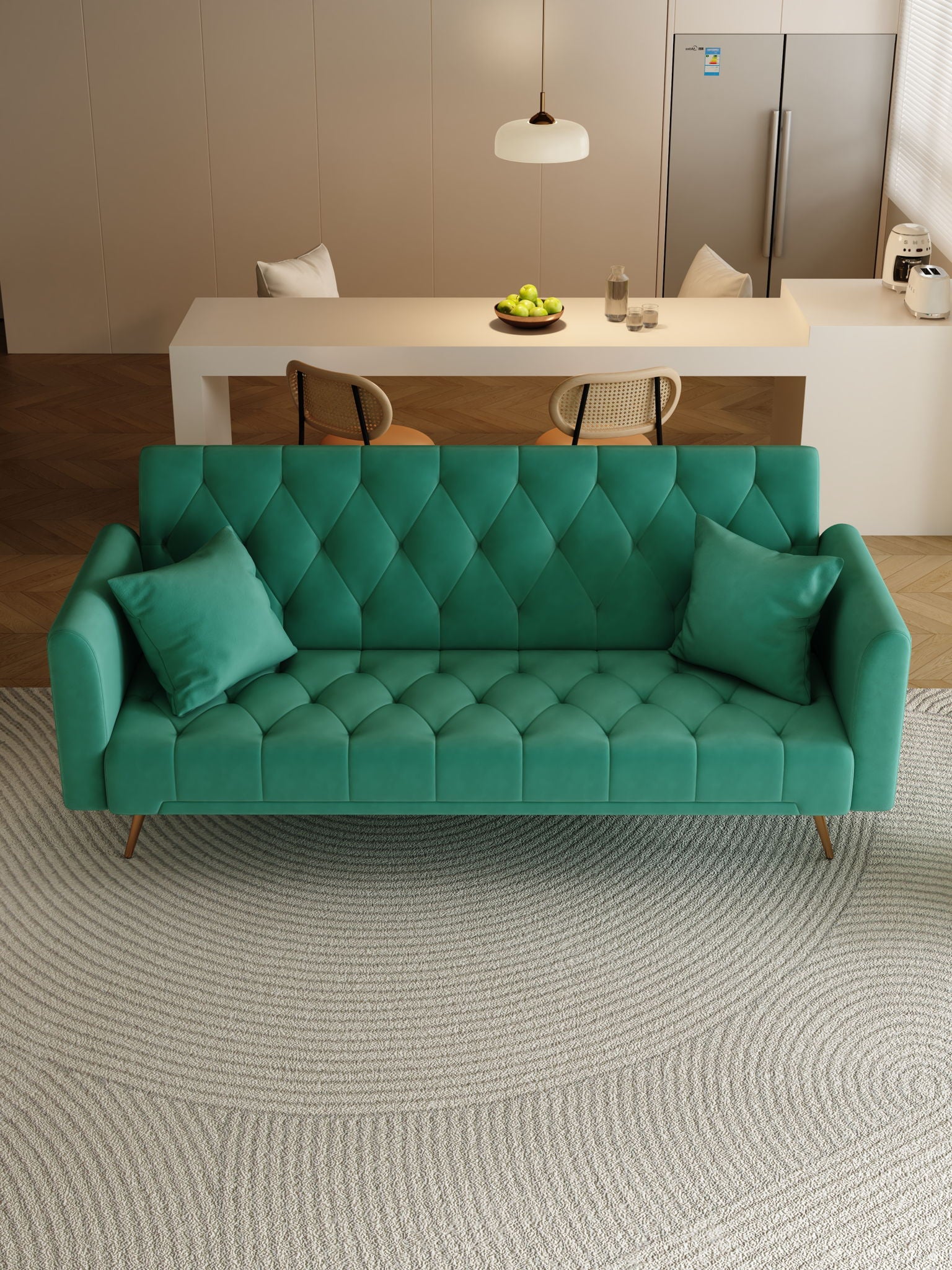 A modern living room features a green Convertible Double Folding Living Room Sofa Bed with two pillows on a textured circular rug. In the background, there's a white table with chairs, a bowl of apples, and a refrigerator.