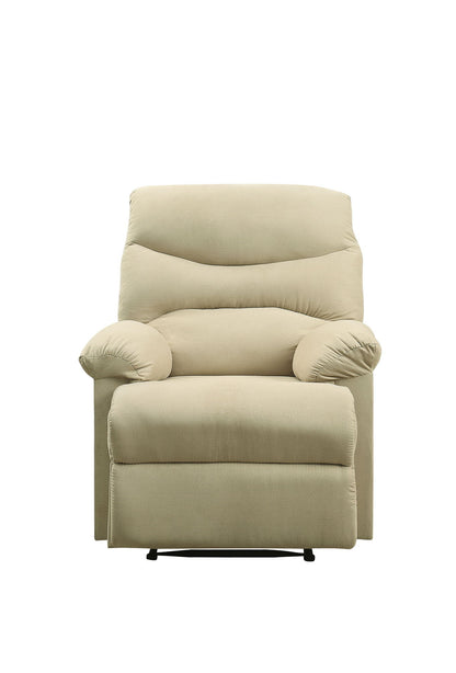 The Arcadia Micro Motion Glider Recliner is a plush beige chair with padded armrests and backrest, shown from the front against a white background.