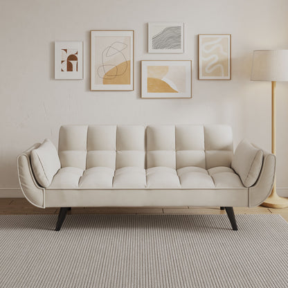 A modern living room featuring the Sofa Soft with two armrests and a throw pillow, abstract art on the wall, a floor lamp, and a light gray textured rug on wooden floors. The minimal decor highlights neutral tones.