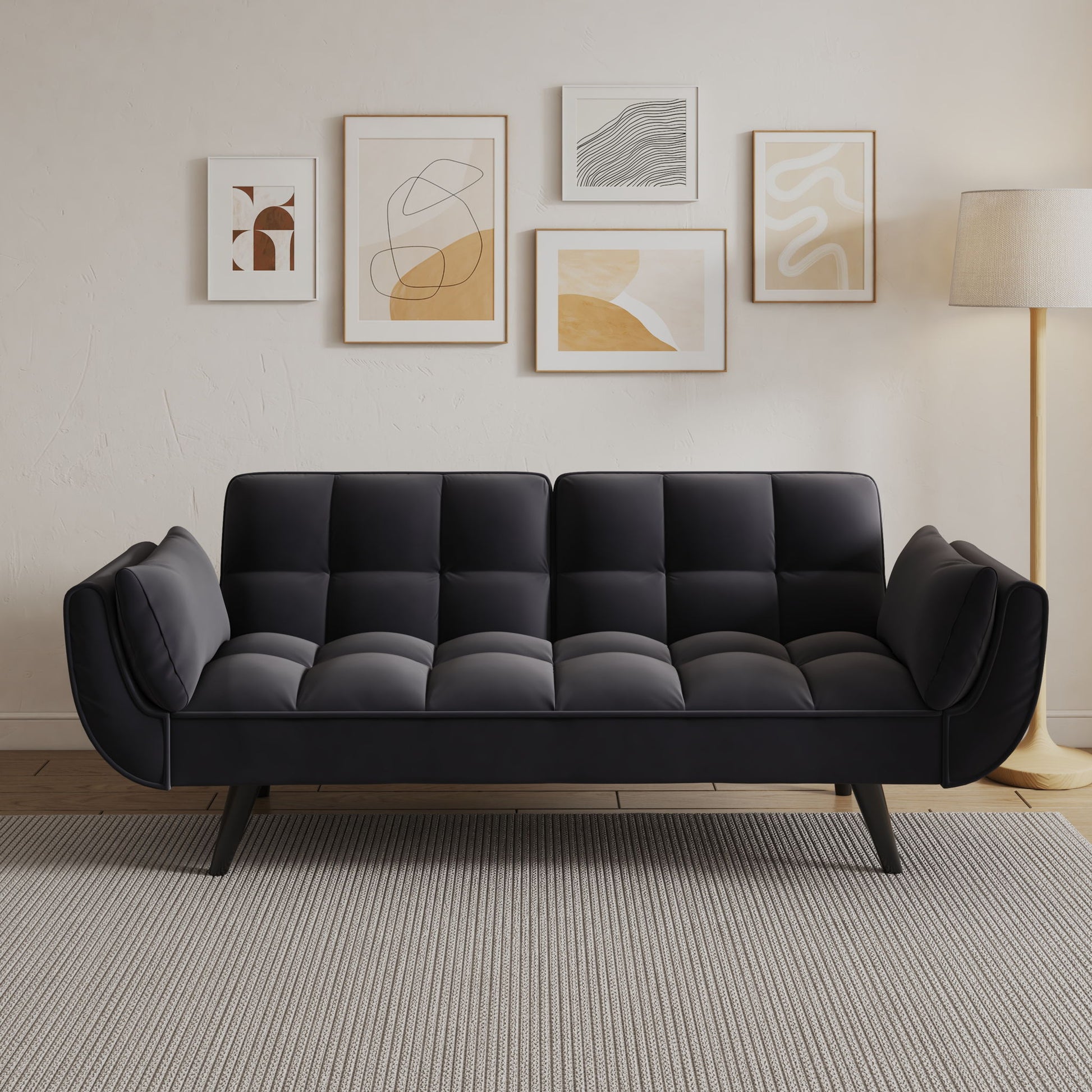 A modern living room featuring the Sofa Soft with two armrests and throw pillow, a light gray rug, a floor lamp, and five neutral-toned abstract art prints hanging on the wall behind the sofa.