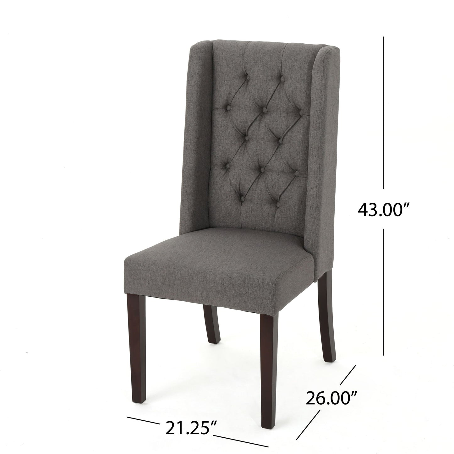 The Sophisticated Tufted Dining Chair With High Back Design features gray fabric upholstery, button-tufted detailing, dark wooden legs, and measures 43"H x 26"D x 21.25"W.