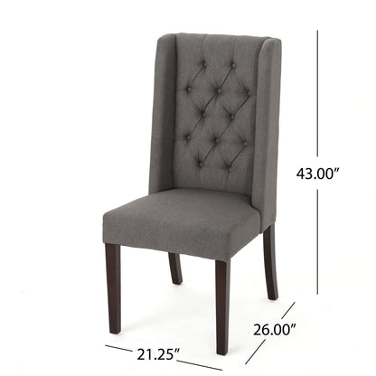 The Sophisticated Tufted Dining Chair With High Back Design features gray fabric upholstery, button-tufted detailing, dark wooden legs, and measures 43"H x 26"D x 21.25"W.