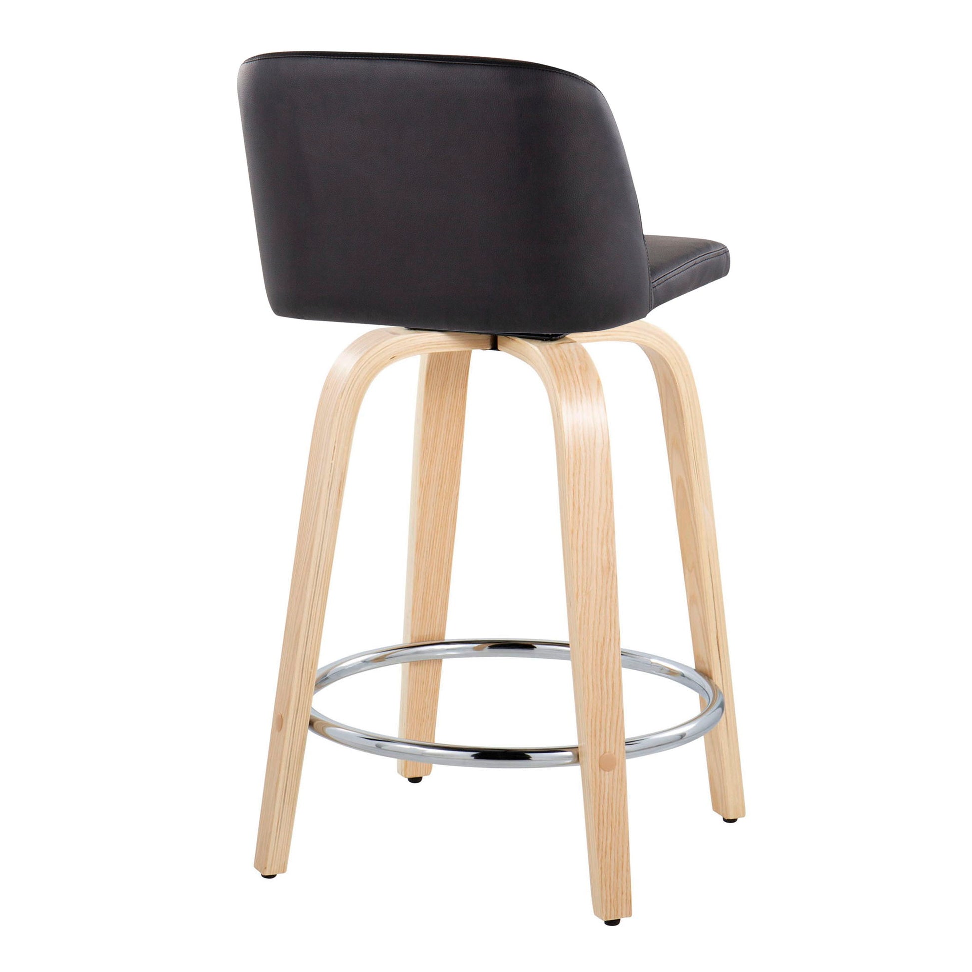 The Toriano Counter Stool set features a contemporary design with a curved black cushioned backrest, light wood legs, and a round chrome footrest, shown from a rear-side angle.