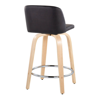 The Toriano Counter Stool set features a contemporary design with a curved black cushioned backrest, light wood legs, and a round chrome footrest, shown from a rear-side angle.