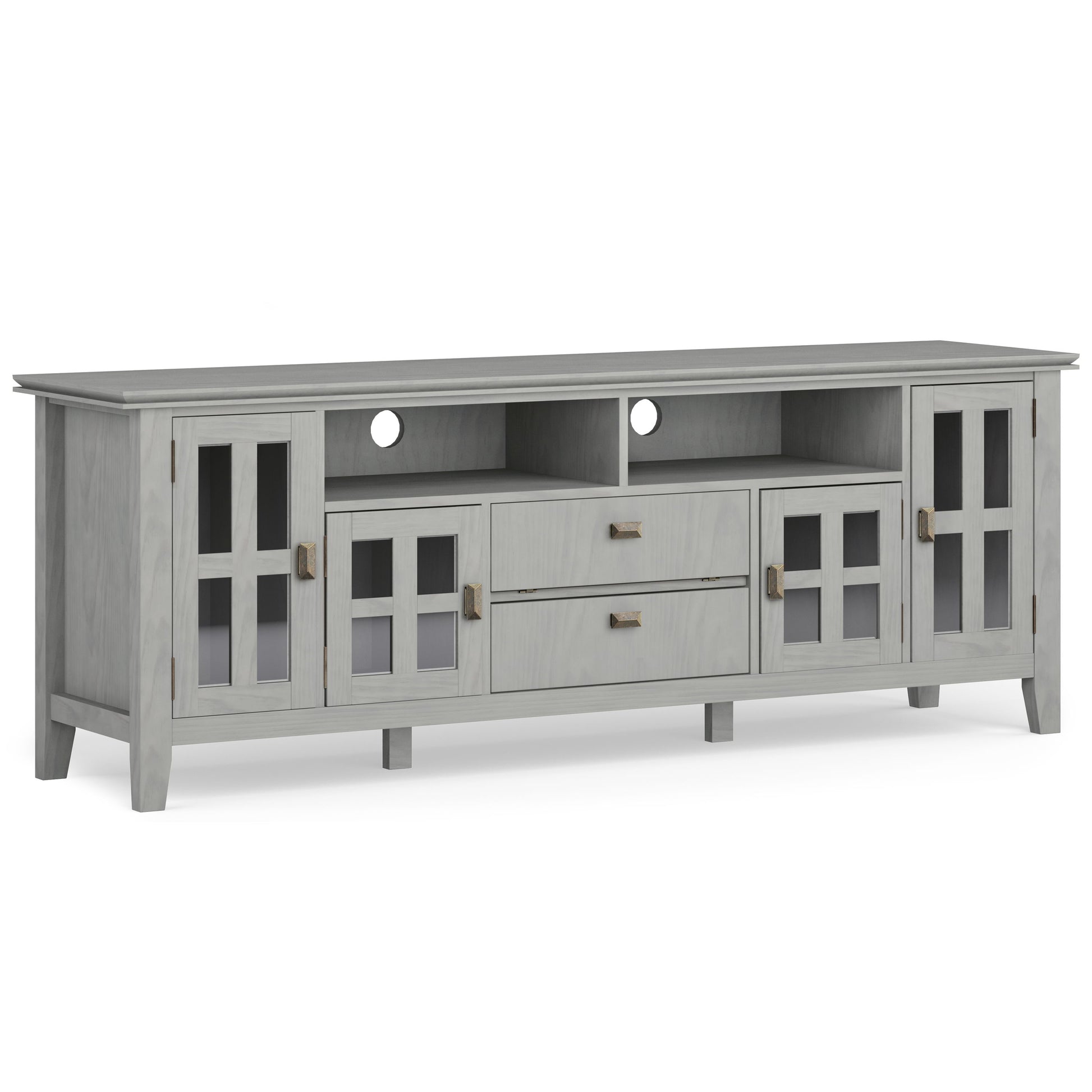 The Artisan TV Media Stand features a light gray wood finish, two glass-paneled side cabinets, two central drawers, two open shelves above the drawers, four legs, and rear cut-outs for cable management.