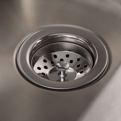 Close-up of the Hennessy Deluxe Laundry Cabinet featuring a stainless steel sink with a metal strainer and central knob, showcasing its sleek, reflective finish and modern design.