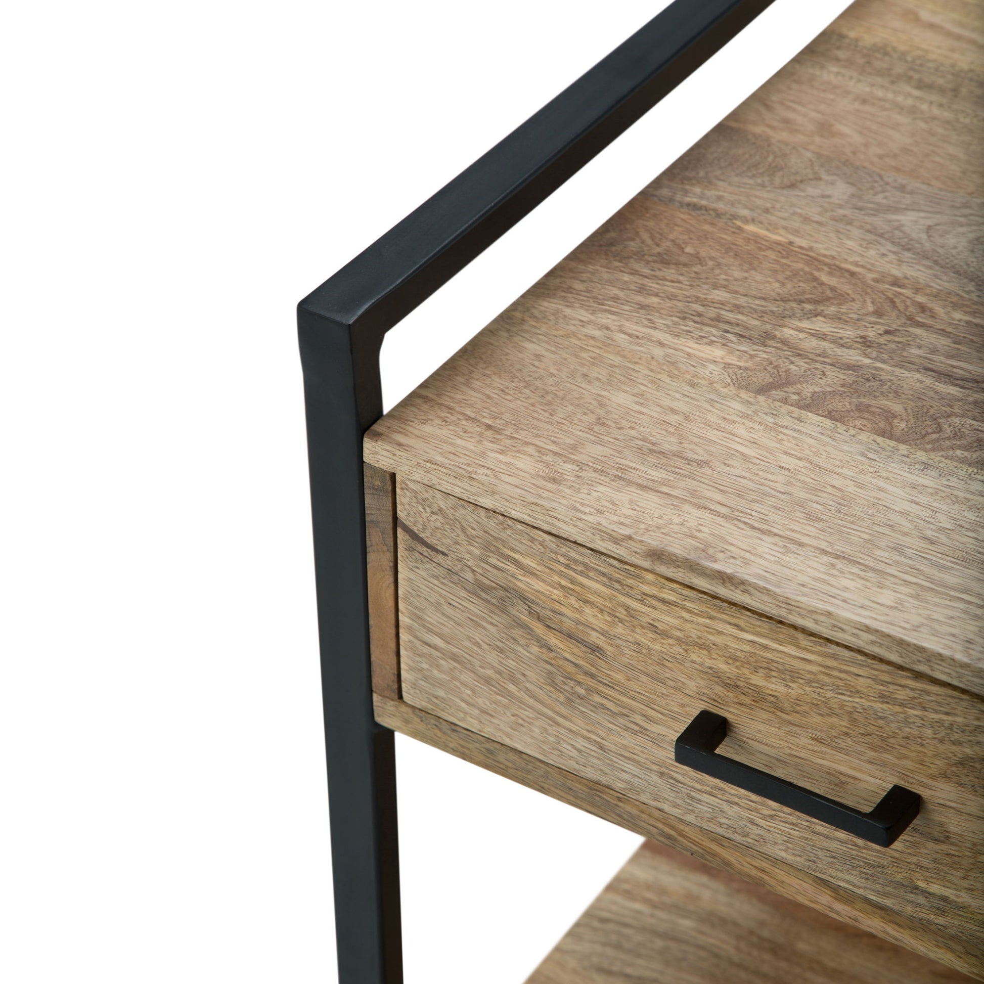 Close-up view of the Riverside - Table featuring a black metal handle and frame, showcasing the corner detail and natural wood grain. The image emphasizes the table's modern, industrial-style design.