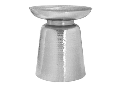 The Drum Accent Side Table features a modern metallic silver finish, a hammered texture, a round flat top, and a tapered cylindrical base.