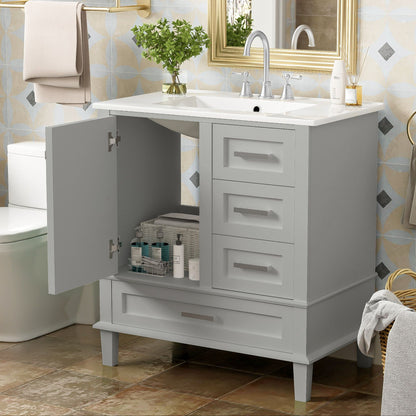 A modern light gray Bathroom Vanity with a solid wood frame features a soft closing door, three drawers, an open cabinet showing organized toiletries, a sink and faucet, potted plant, and countertop toiletries. Towel hangs nearby for convenience.