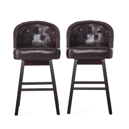 A set of two Mellifluous 360 Degree Swivel Bar Stools with tufted backs, stunning nailhead trim, and wooden legs are positioned side by side against a white background.