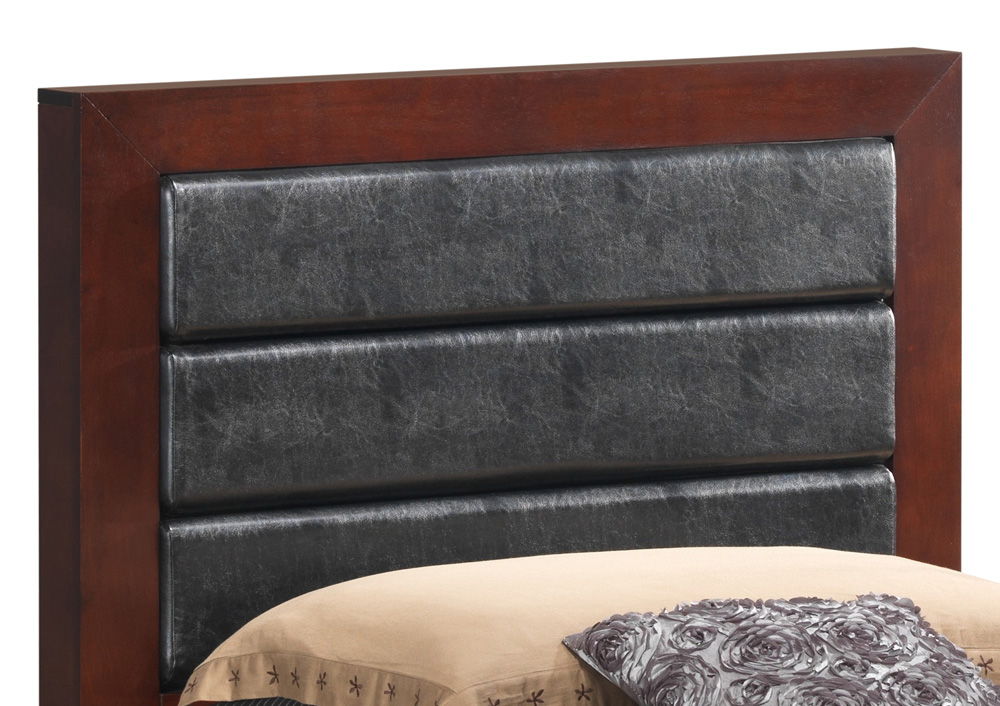 A close-up of the Transitional Modern Design Bed's dark wooden headboard with three horizontal padded black leather panels, partially showing a beige bedspread and a decorative gray pillow at the bottom.