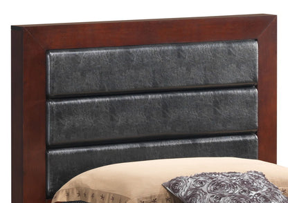 A close-up of the Transitional Modern Design Bed's dark wooden headboard with three horizontal padded black leather panels, partially showing a beige bedspread and a decorative gray pillow at the bottom.