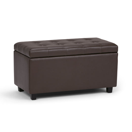 The Cosmopolitan Storage Ottoman in chocolate brown features a rectangular, tufted leather design with short black legs and a hinged lid for convenient storage.