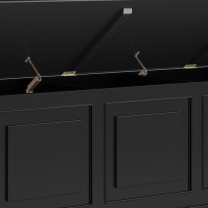 A close-up of the Connaught Handcrafted Storage Bench Trunk in black, showing its hinged lid open with metal support arms and detailed front panel design.