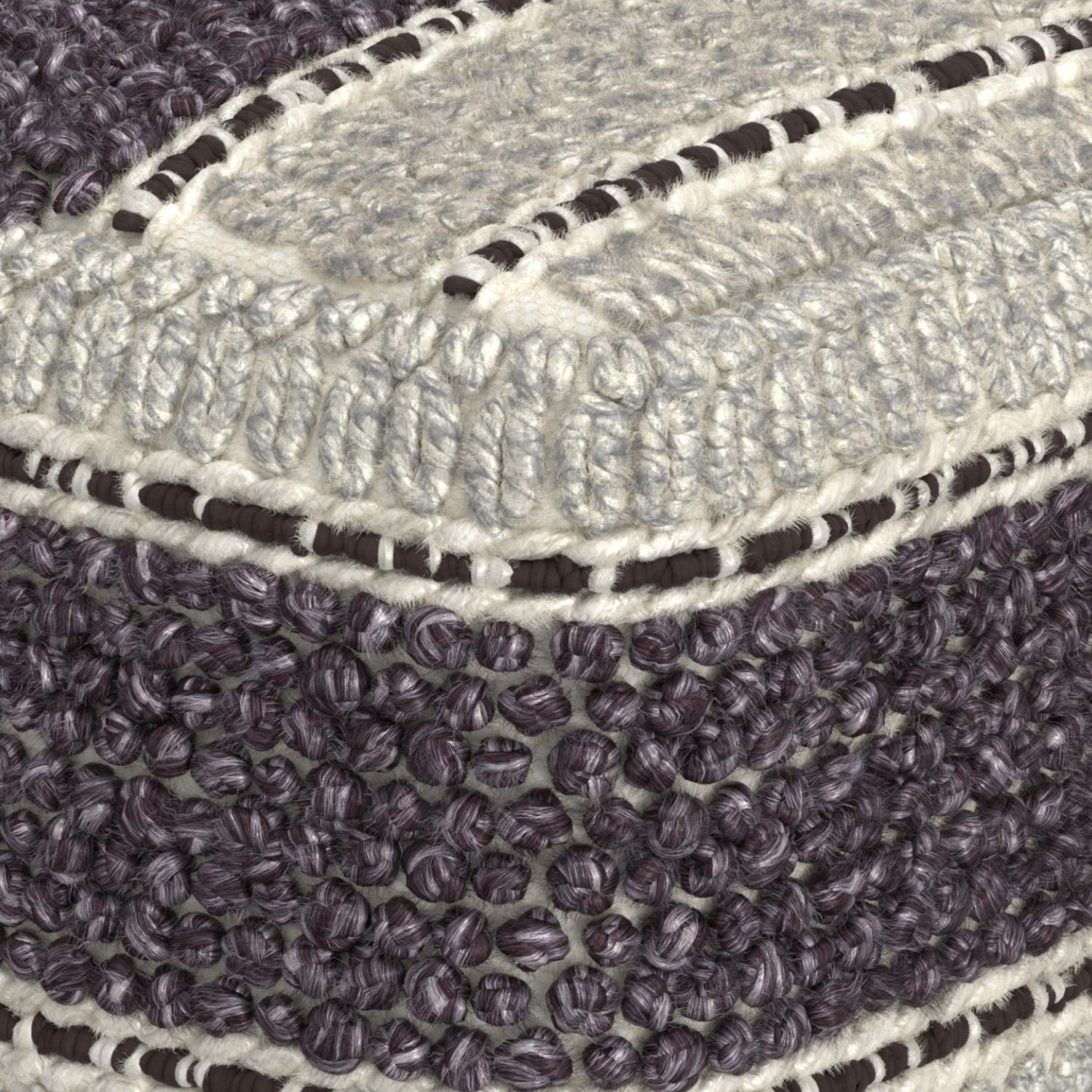 Close-up of the Grady - Handcrafted Square Pouf, highlighting its textured gray, cream, and dark purple fabric with a mix of looped and woven patterns, detailed stitching, and visible fibers at the corner.