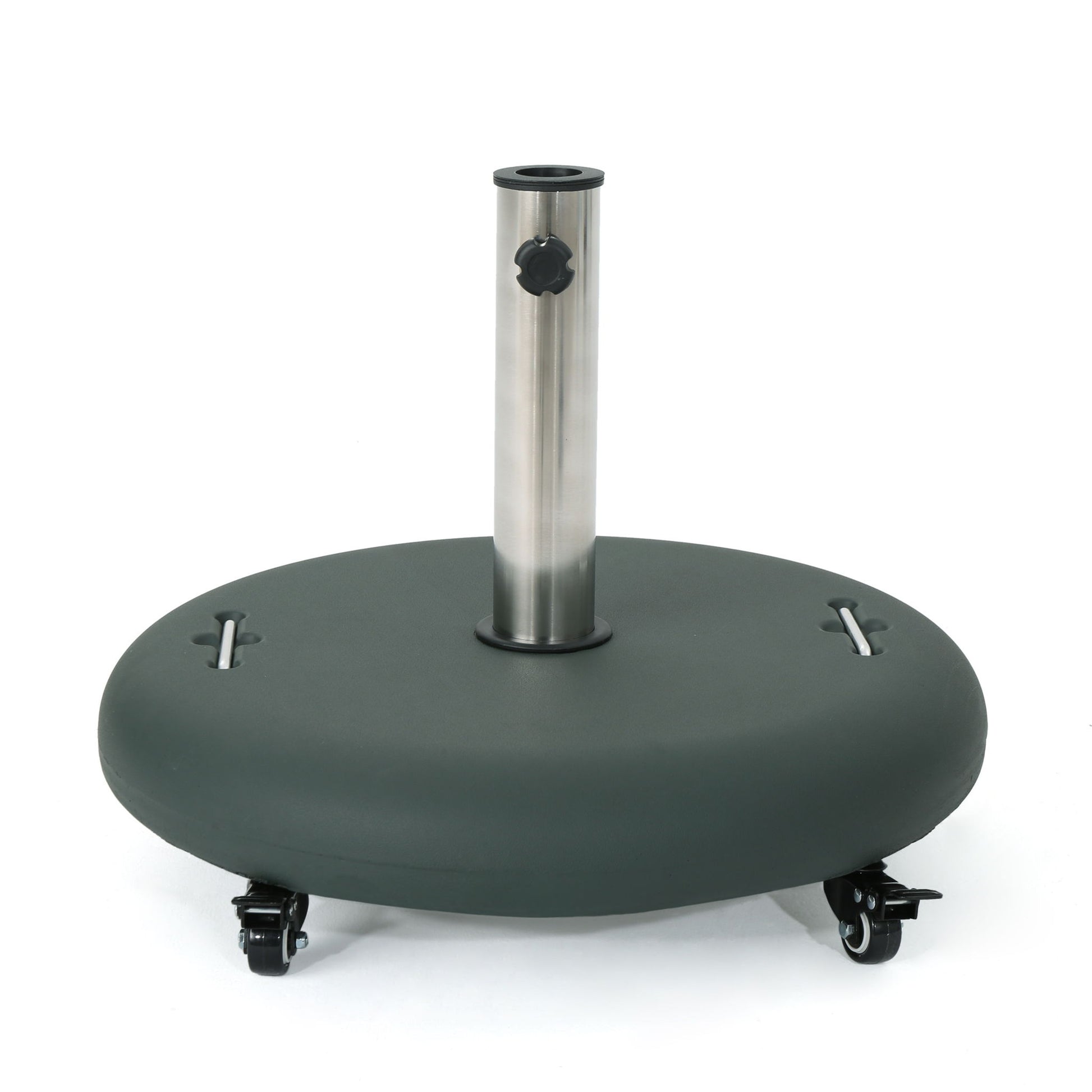 The Wheelie - Round Umbrella Base With Stainless Steel Holder features a dark green round base, central stainless steel pole, adjustment knob, and four black caster wheels for easy movement, shown against a white background.