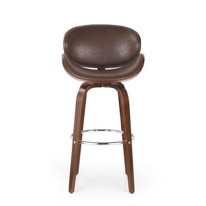 The Lumos Mid Century Modern Upholstered Swivel Barstool features a curved brown leather seat, wooden legs, and a chrome footrest, displayed against a plain white background.