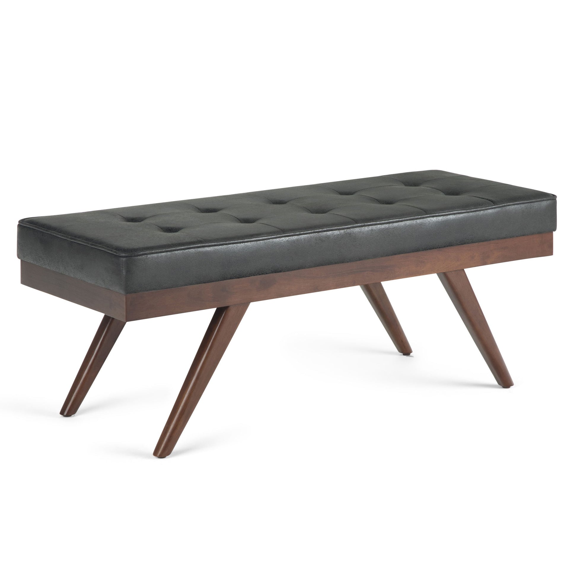 The Pierce - Mid Century Upholstered Ottoman Bench features a black tufted cushion and angled wooden legs, showcasing a modern mid-century design.