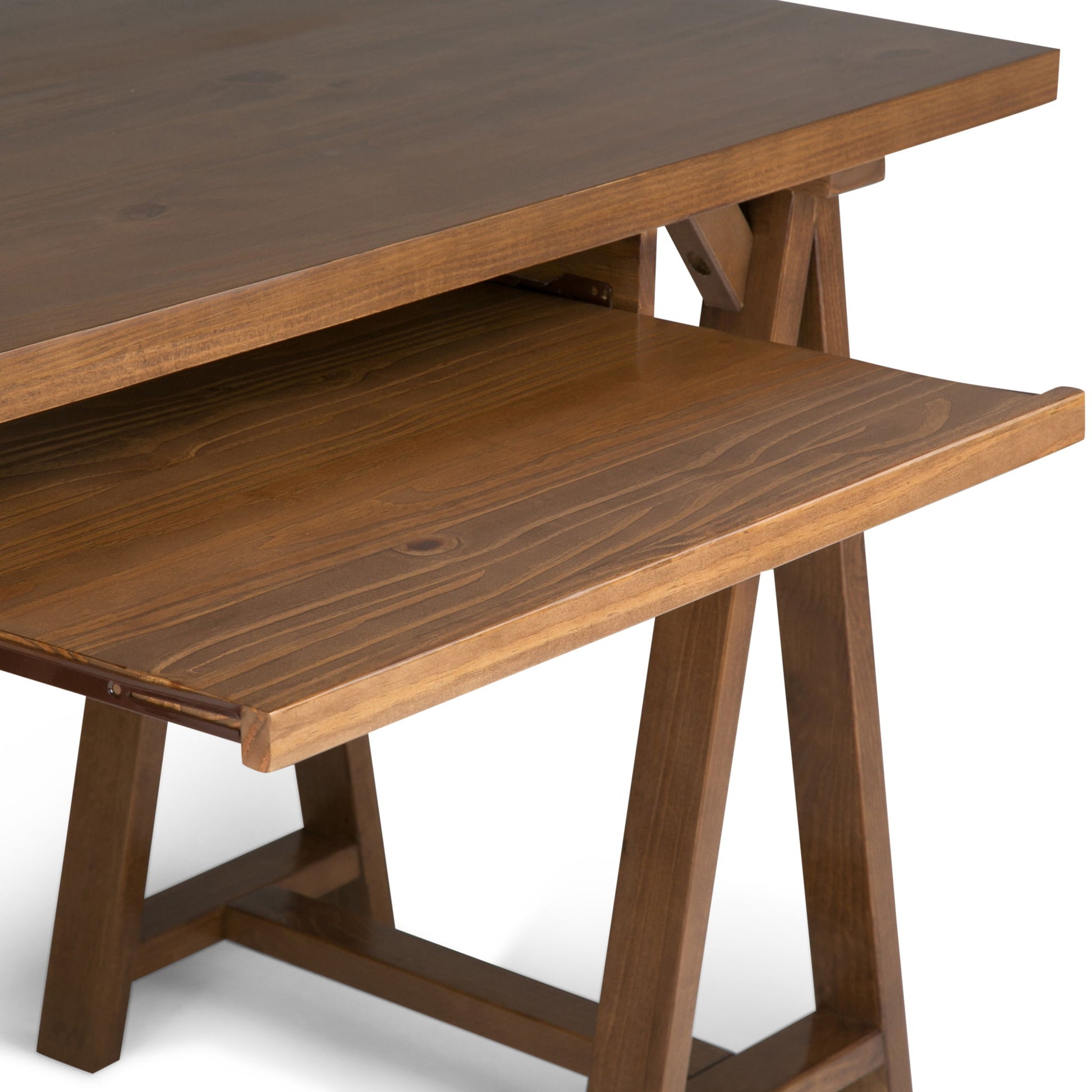 A detailed view of the Sawhorse - Handcrafted Desk, showcasing its pull-out keyboard tray, natural wood finish, and sturdy legs.