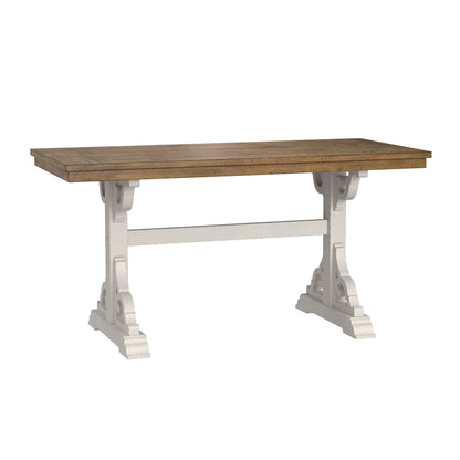 The Haidel - Trestle Dining Table features a rectangular natural wood top and white ornate trestle-style legs joined by a horizontal crossbar.